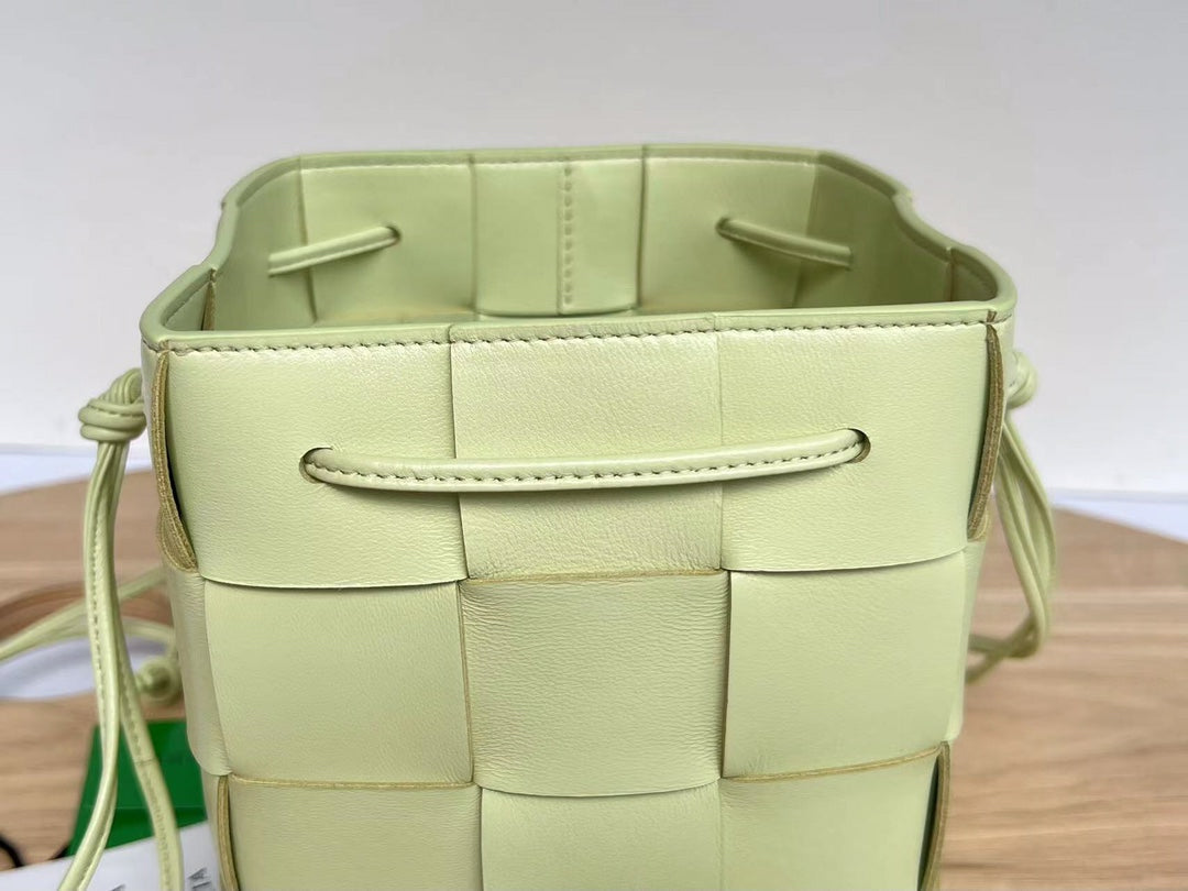BOTTEGA VENETA SMALL CASSETTE BUCKET 18 IN PASTEL YELLOW CALFSKIN