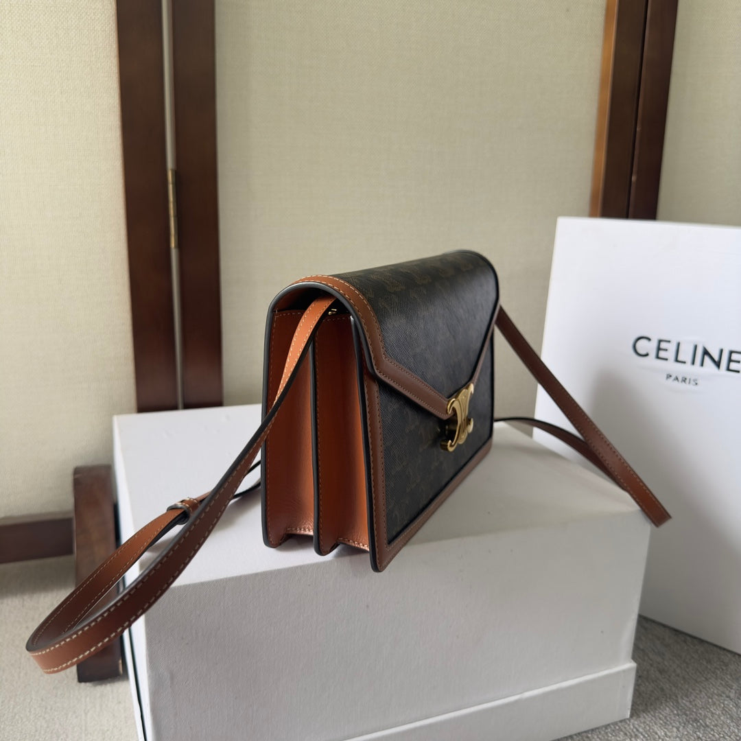 CELINE 25S WALLET MARGO 22MM IN BLACK TRIOMPHE CANVAS AND BROWN CALFSKIN