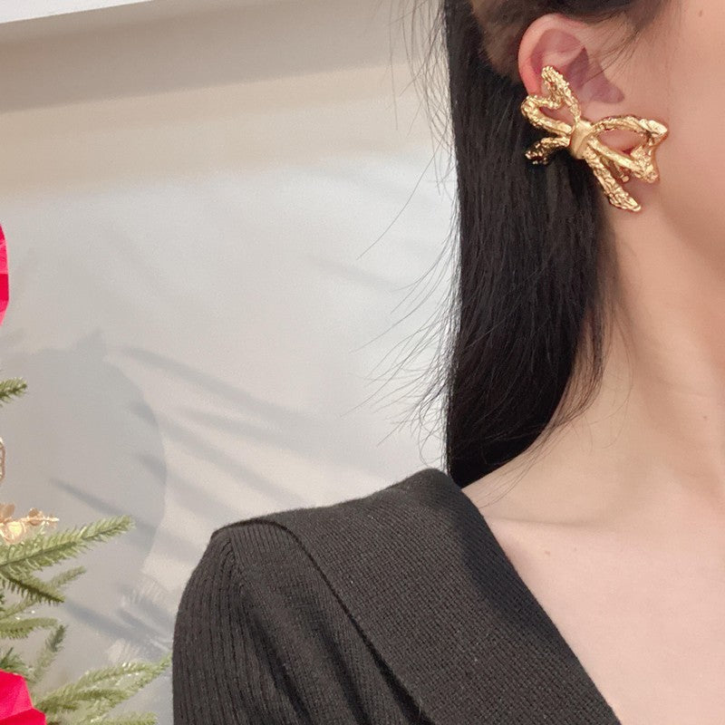 18K YSL 26C Butterfly Gold Earrings
