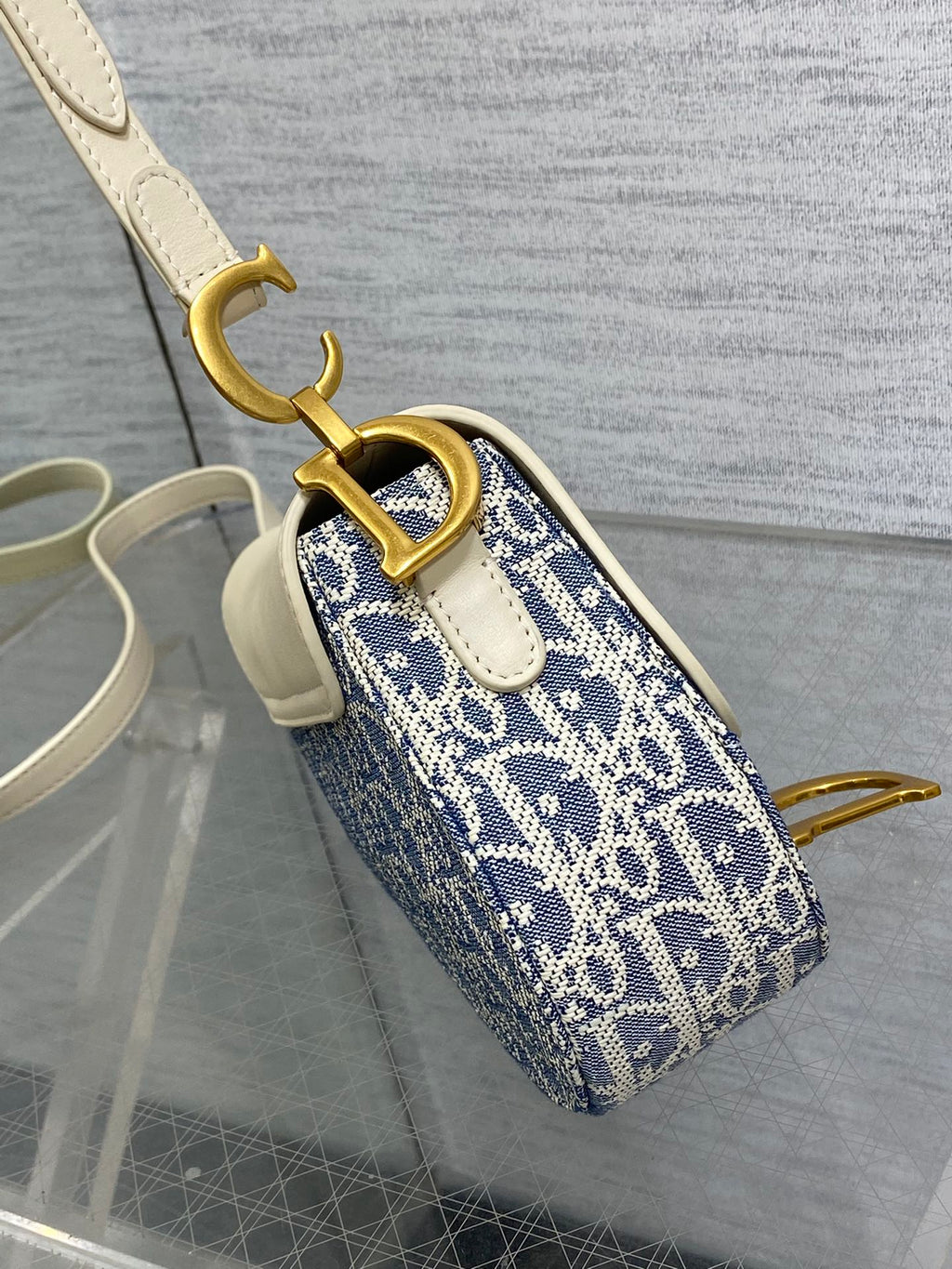DIOR 25S MINI SOFT SADDLE BAG 19 IN BLUE DIOR OBLIQUE CHAMBRAY AND IVORY SMOOTH CALFSKIN