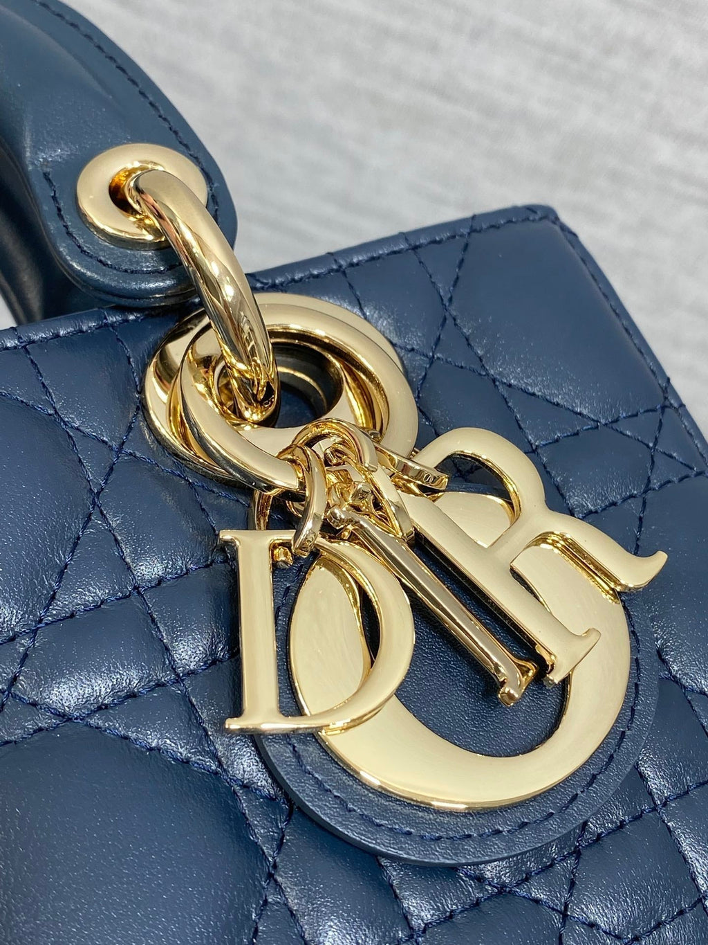 DIOR 25S SMALL LADY D‑JOY BAG 19 IN DARK BLUE CANNAGE CALFSKIN GOLD HARDWARE
