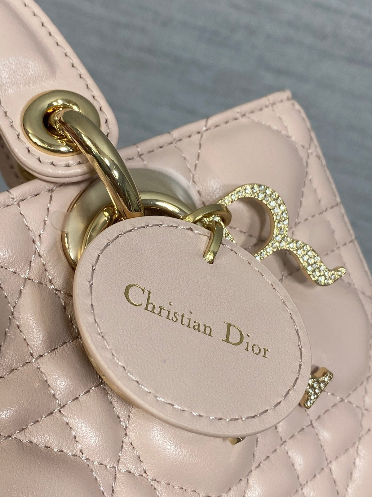 DIOR 25S SMALL LADY D‑JOY BAG 22 IN BABY PINK CALFSKIN GOLD HARDWARE