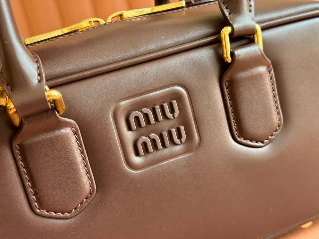 ARCADIE BAG 27 IN COPPER BROWN SHINY CALFSKIN