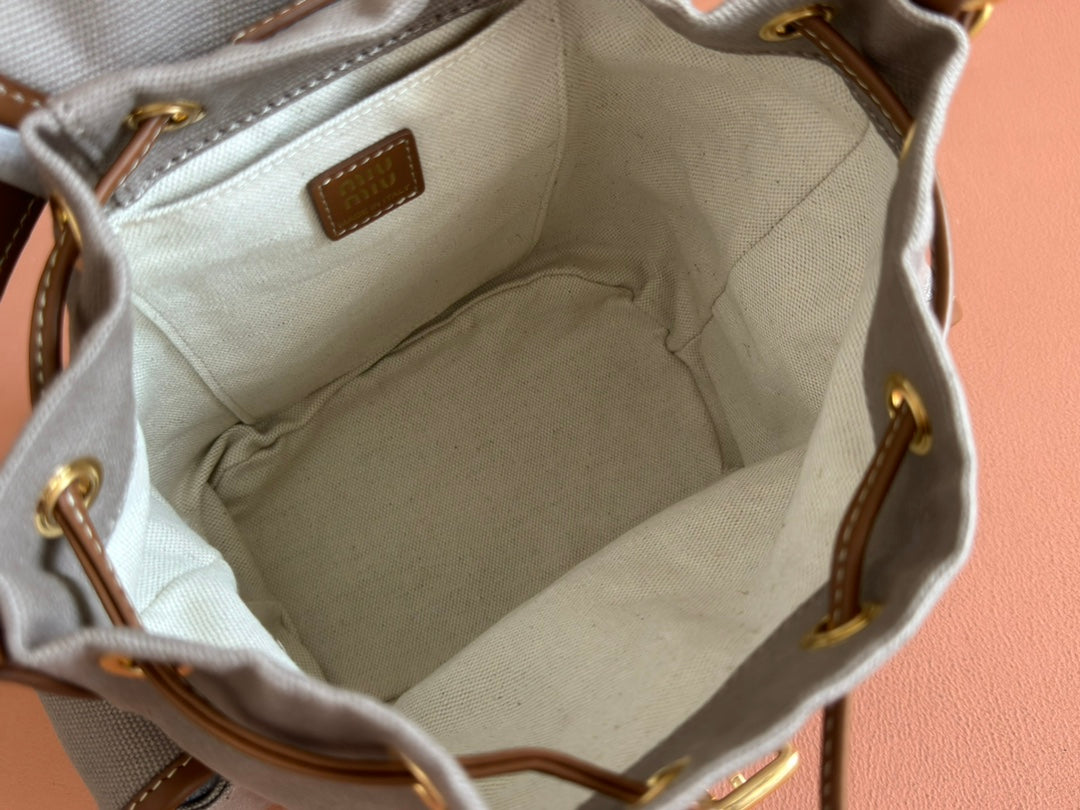 BACKPACK 22 IN GREY CANVAS BROWN CALFSKIN
