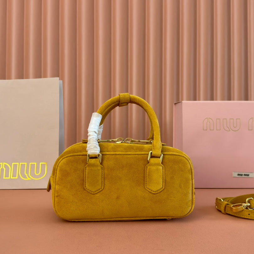 ARCADIE BAG 22 IN MUSTARD YELLOW SUEDE GOLD HARDWARE