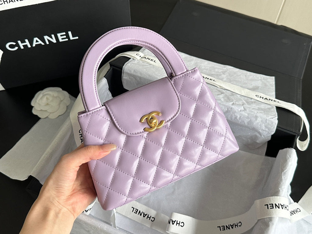 CHANEL VINTAGE KELLY 25S 19 CM IN PURPLE LAMBSKIN WITH GOLD HARDWARE