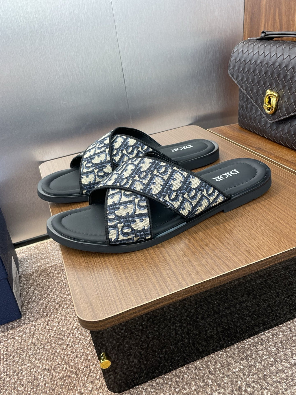 DIOR 25S ALIAS CROSS-STRAP SLIDES IN BLACK CALFSKIN WITH CD OBLIQUE DEEP BLUE LOGO