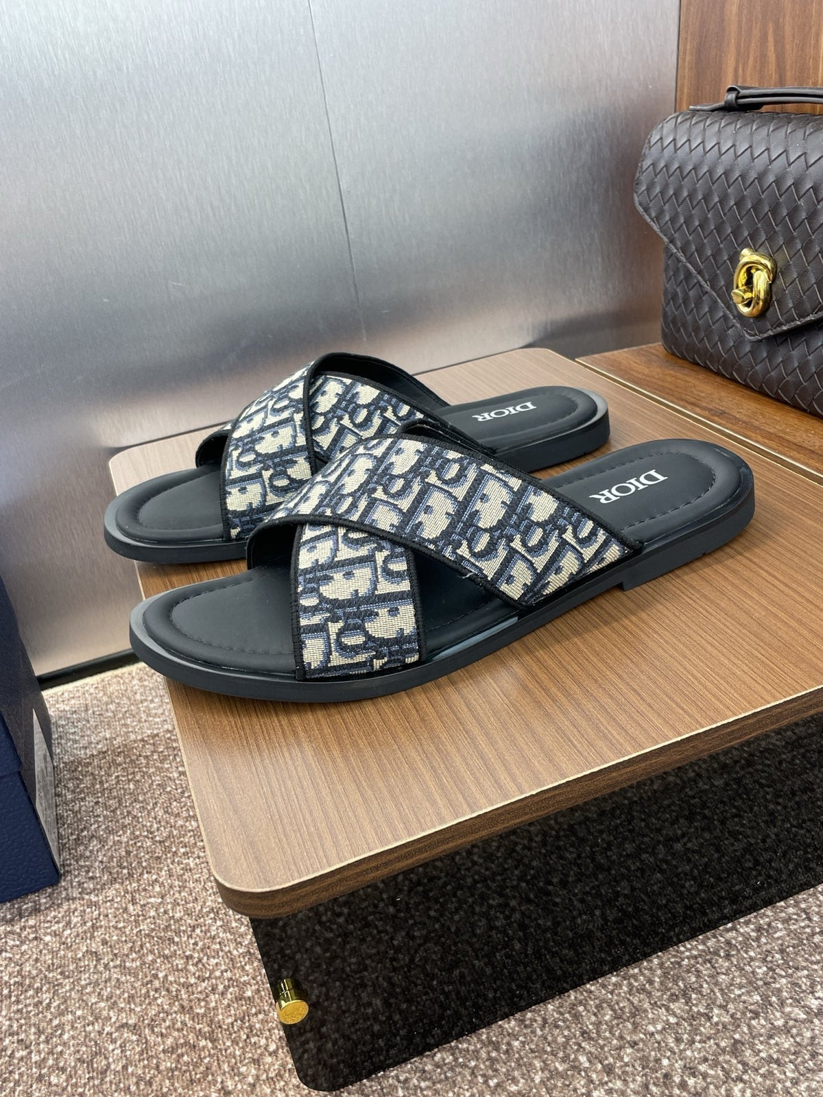 DIOR 25S ALIAS CROSS-STRAP SLIDES IN BLACK CALFSKIN WITH CD OBLIQUE DEEP BLUE LOGO
